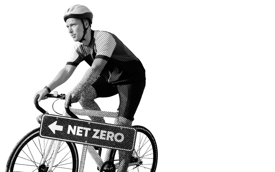 Man on bike riding towards Net Zero.