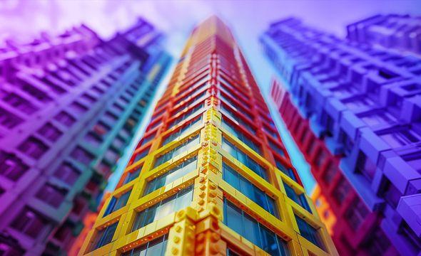 A skyscraper made from LEGO bricks representing scalable growth