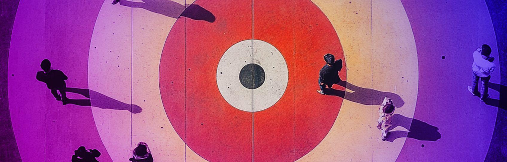 aerial view of a target with people walking across it