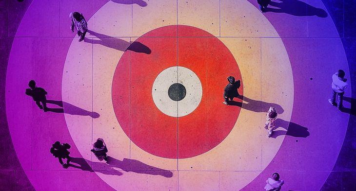 aerial view of a target with people walking across it