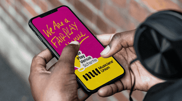 Fair play venue design assets on a mobile phone.