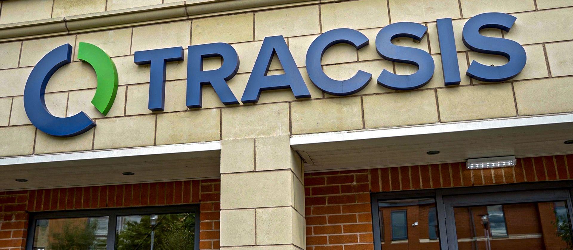The Tracsis logo on a building.